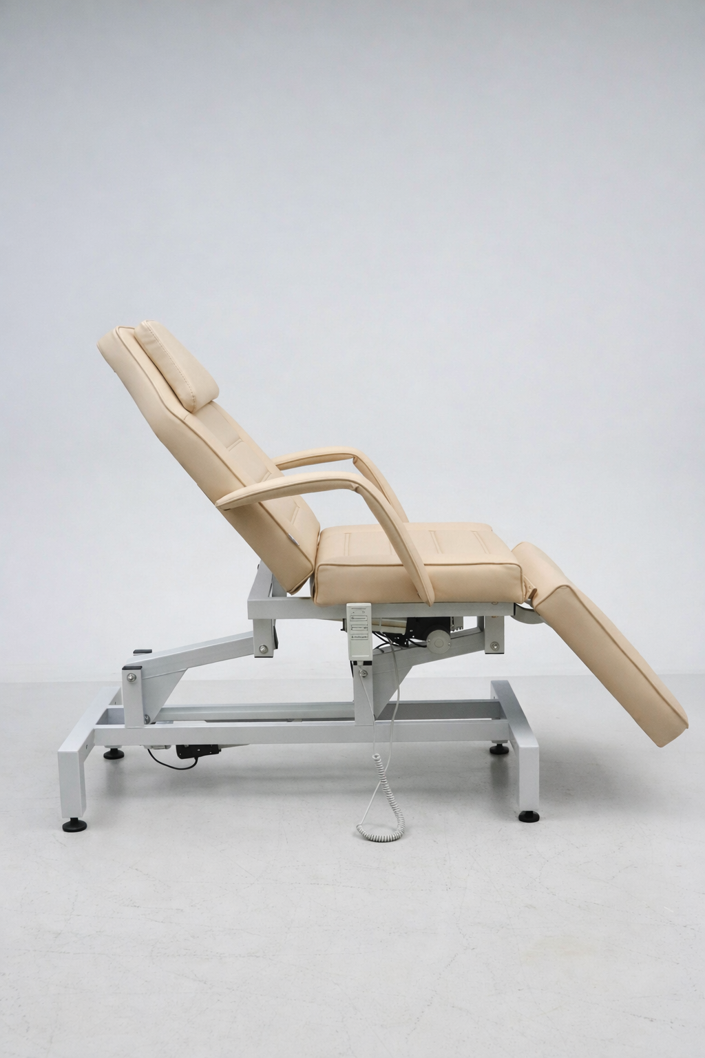 Adjustable salon and medical treatment chair in latte finish with padded comfort and durable commercial-grade upholstery