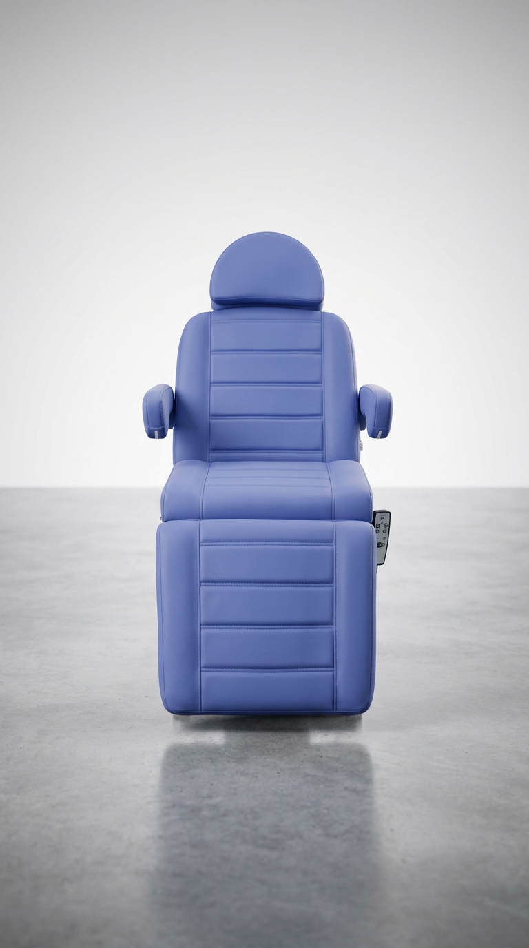 Modern podiatry treatment bed featuring blue vinyl cushioning, adjustable sections, and built-in foot debris tray