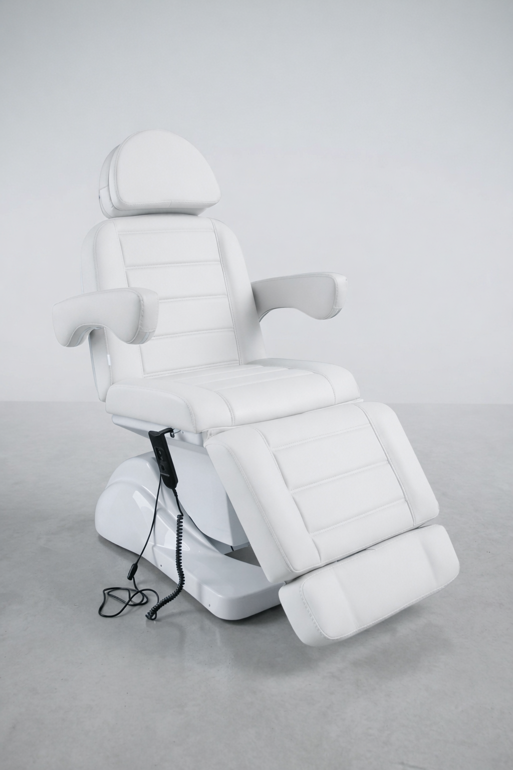 Commercial beauty bed with white cushioned design, reclining backrest and leg support, suitable for clinics, spas, and salons