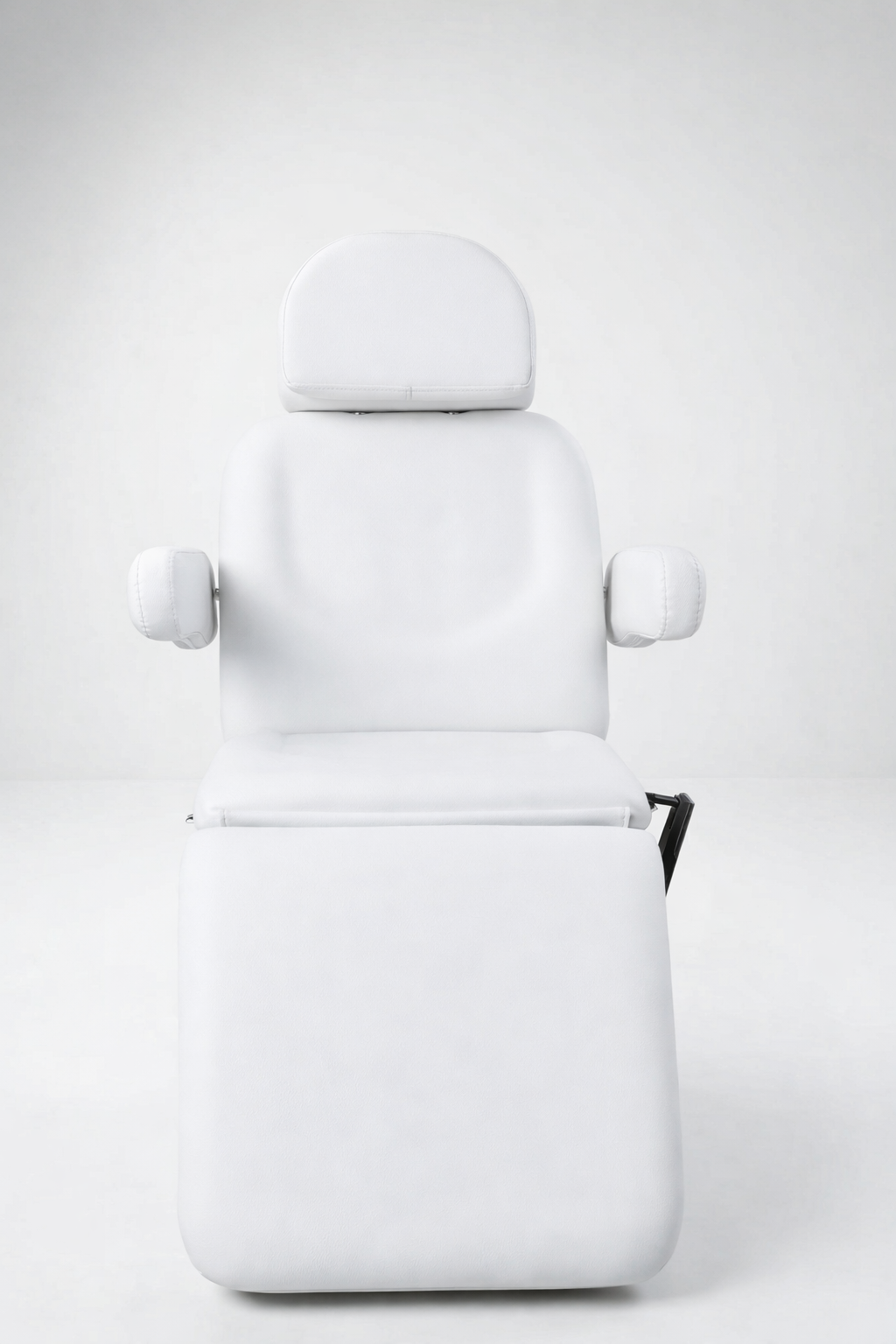 Electric white cosmetic bed with segmented cushioning and smooth positioning, suited for facial treatments and injectables