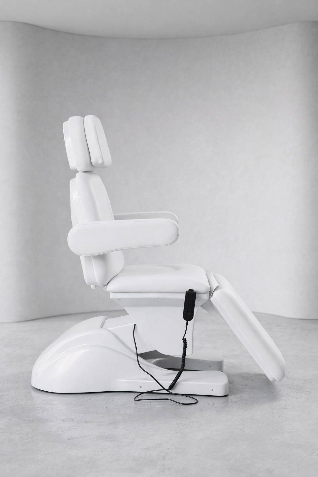Professional white treatment table with adjustable back and leg sections, built for beauty clinics and skin therapy rooms