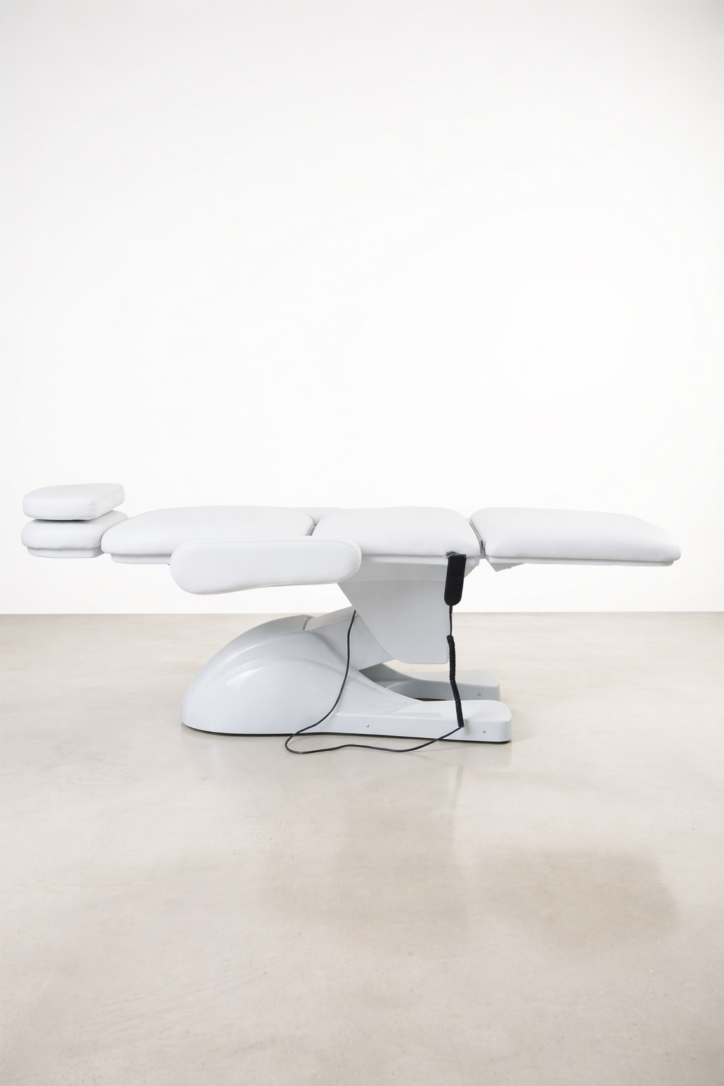 Sleek white aesthetic chair with adjustable positioning and durable vinyl finish, ideal for modern beauty and medical clinics